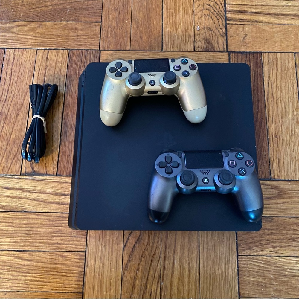PlayStation 4 Slim with Two Controllers and Power Cord